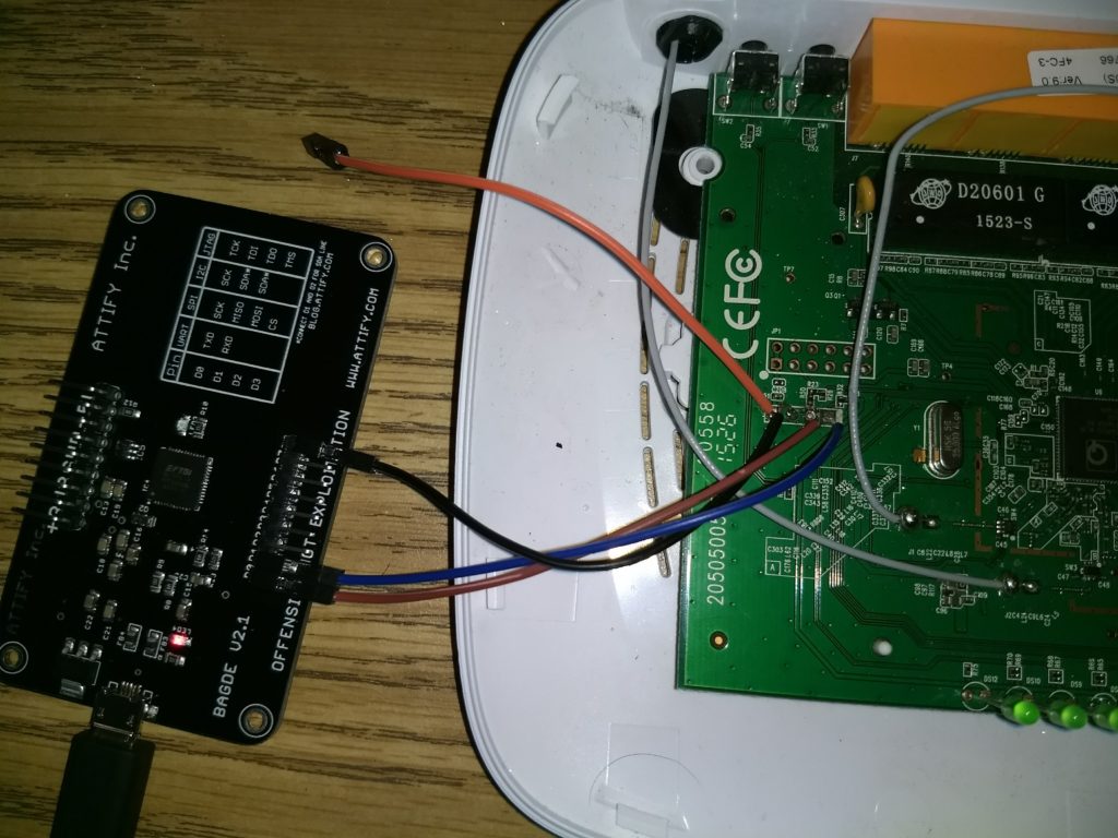 TP-Link UART pads wired to the Attify Badge